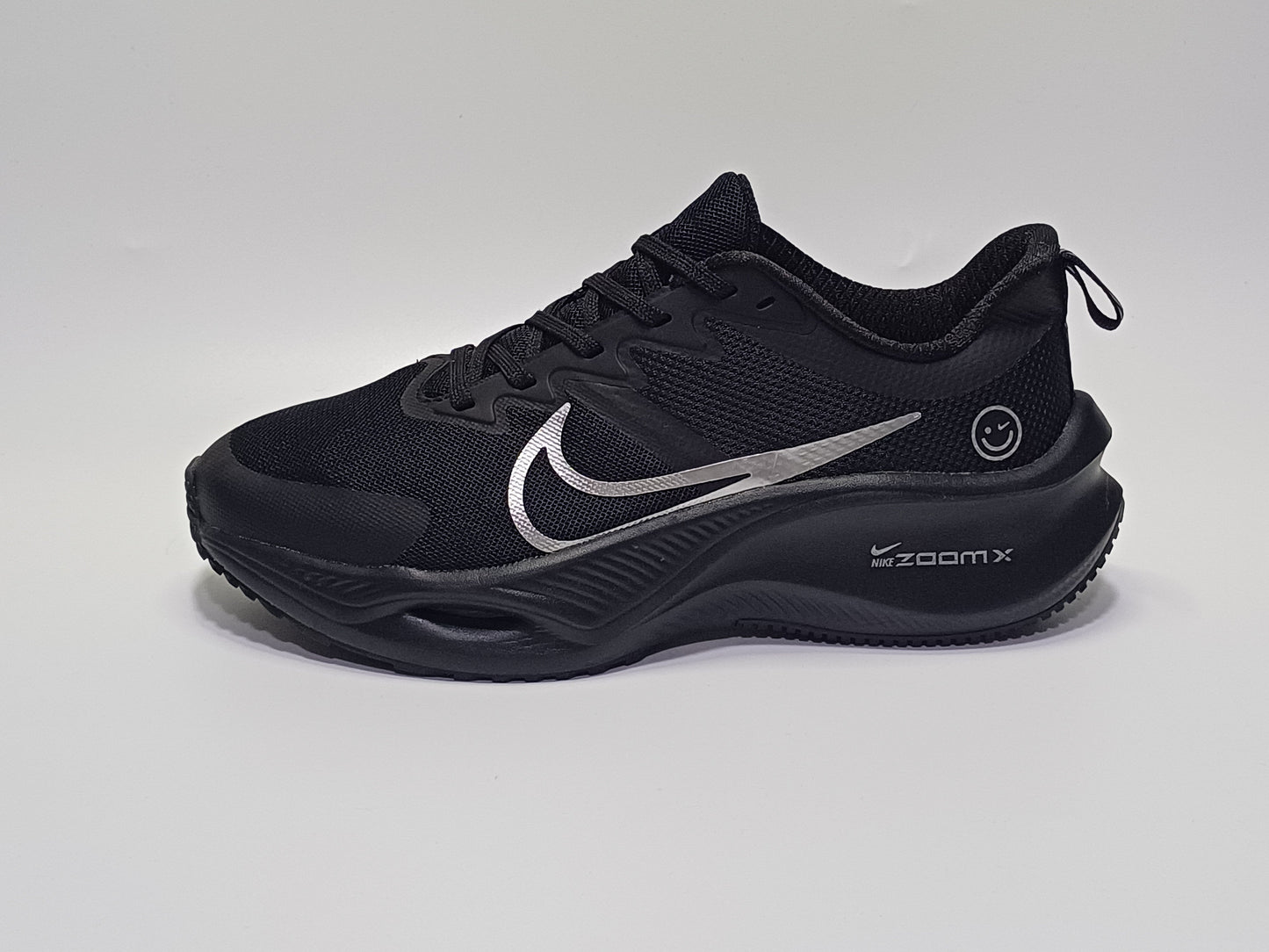 Nike Zomm Happy Negro Plata