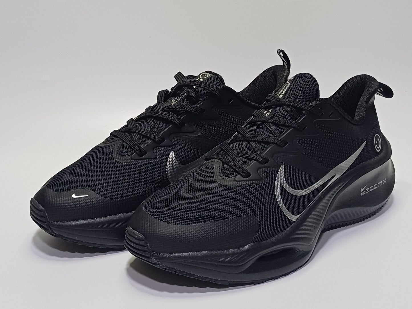 Nike Zomm Happy Negro Plata