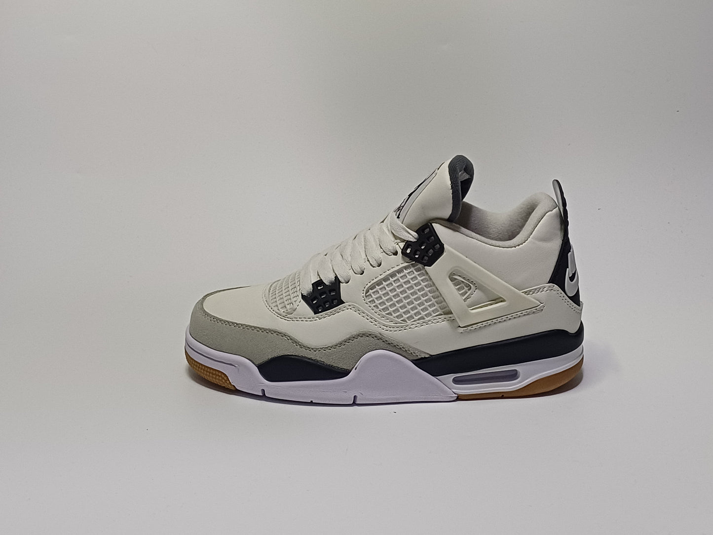 Jordan Retro 4 x SB Blanca Negra